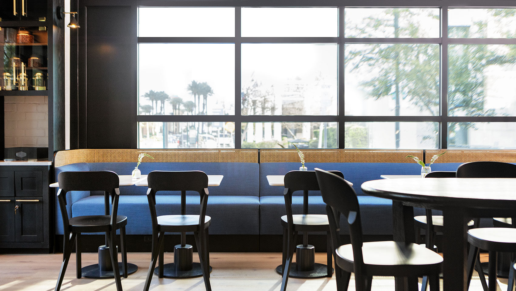 cafe windows with tables and chairs