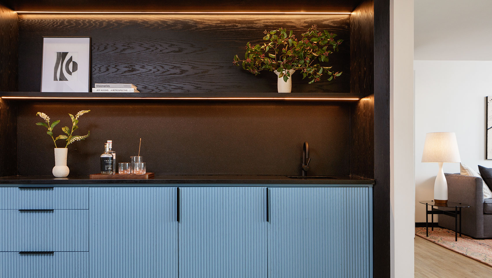 large wooden bookcase with wet bar