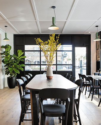 cafe large dining table with flowers